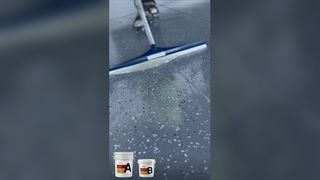After Epoxy Flake Floor Coating: flat, dust free, flake texture hiding every flaw.